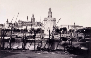 Sevilla._El_Guadalquivir_la_Torre_del_Oro_y_la_Catedral